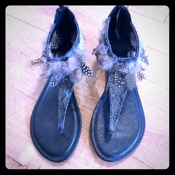 sandals with feathers around the ankle
