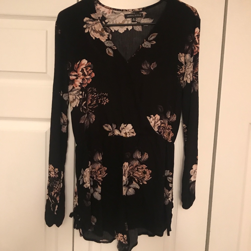 Kendall & Kylie black floral long sleeve romper.