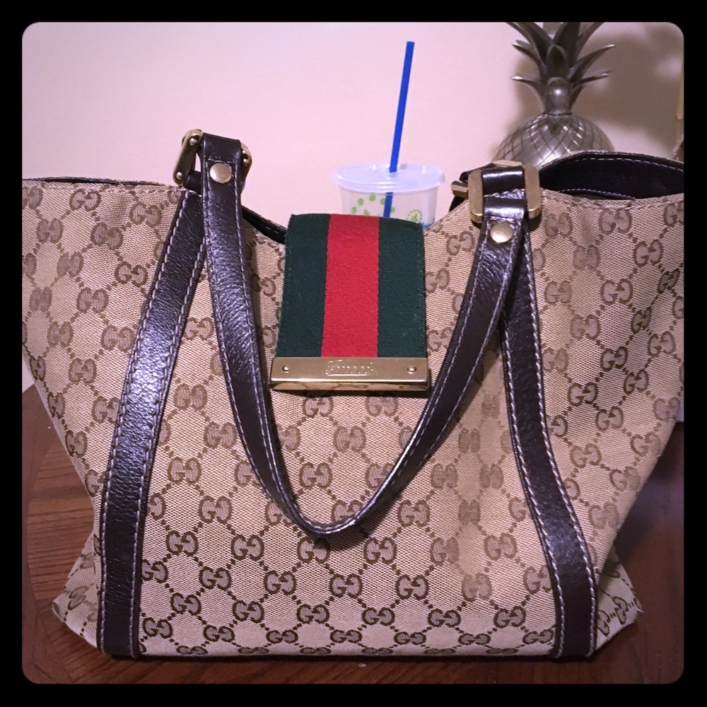 SOLD Gucci supreme web adjustable bag