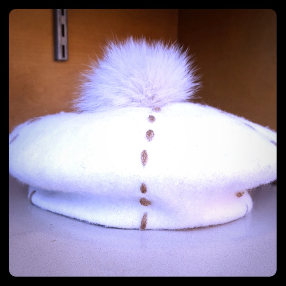 Wool pom  pom creme beret hats.