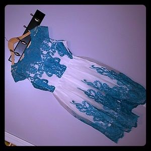 White tea length dress with turquoise overlay
