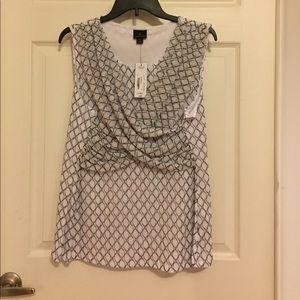 Brand new tags still on. Sleeveless dress top. Xl