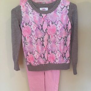 Pink pants w matching snake skin patterned sweater