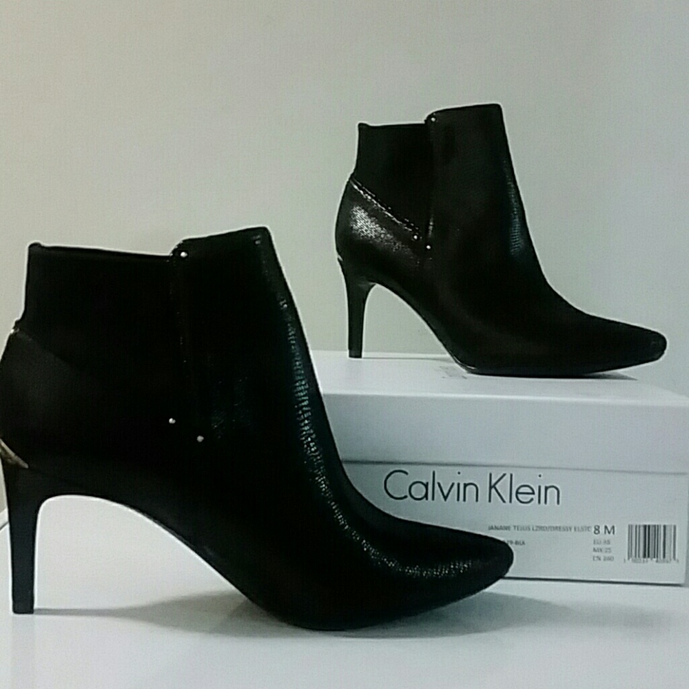 Winter fashionable, black leather ankle boots