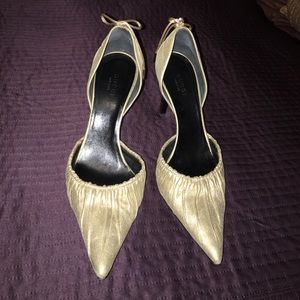 Gucci gold slip on heels