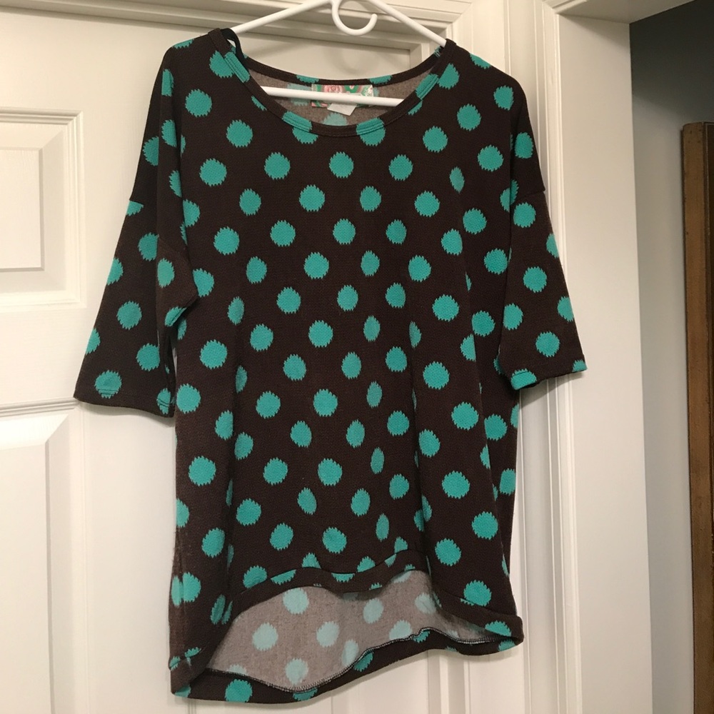 Piko-like quarter length sweater.