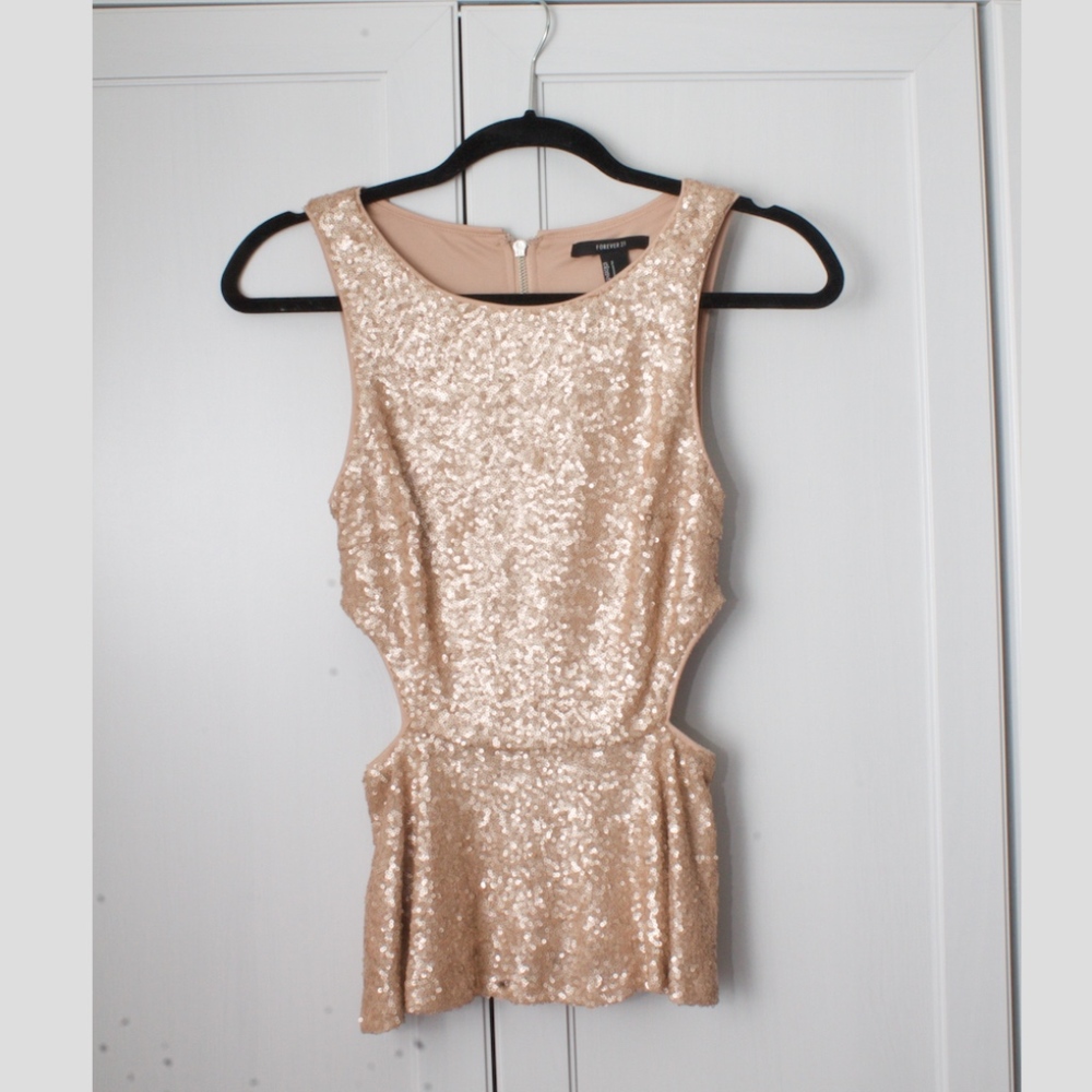 Sequin Peplum Top with side cutouts