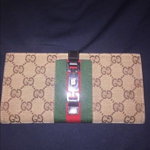 Authentic monogram Gucci wallet