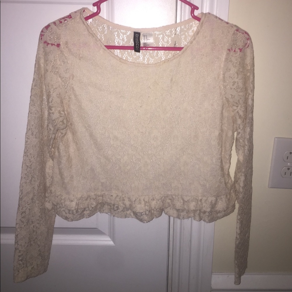 Light pink/cream lace top with ruffles on bottom