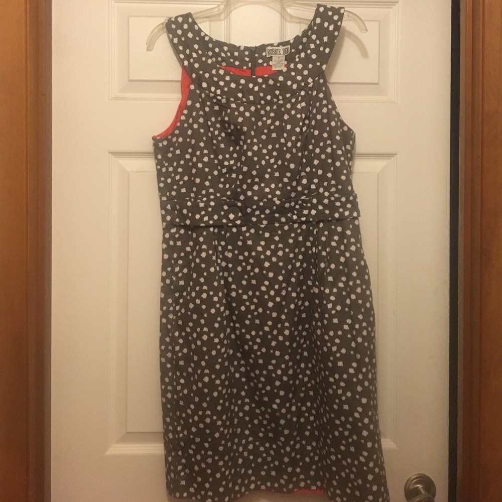 Grey dress with white dots. 97% cotton/3% spandex.
