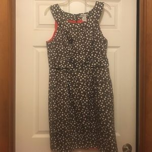 Grey dress with white dots. 97% cotton/3% spandex.