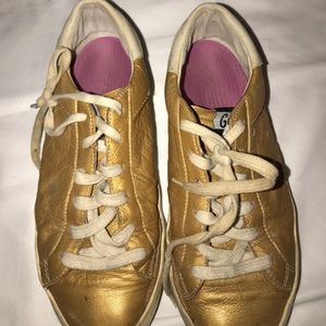 Gold golden goose sneakers