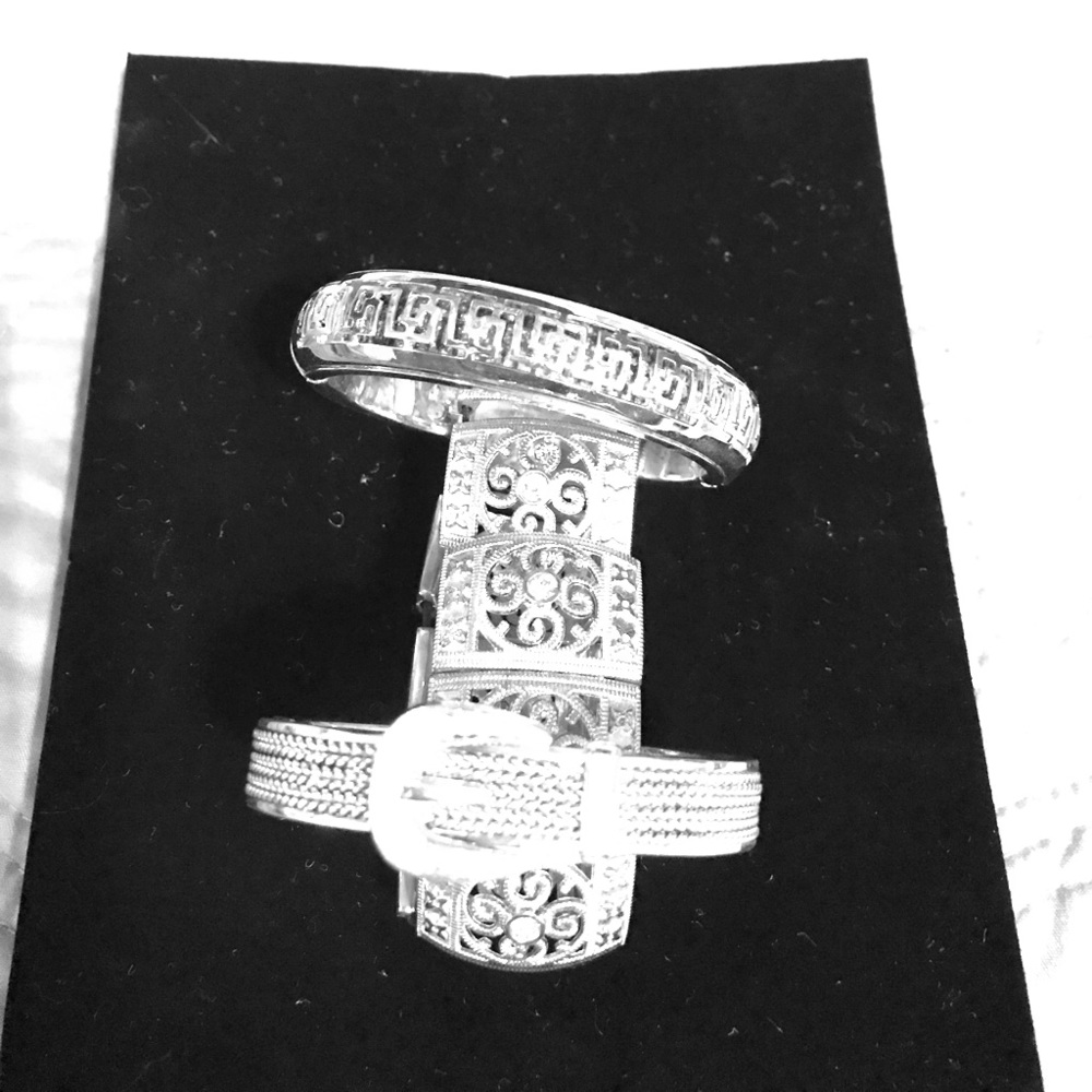 Bundle of Silver Bangle Bracelets.