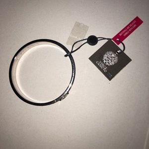 New! Easy to accessorize navy snakeskin bangle