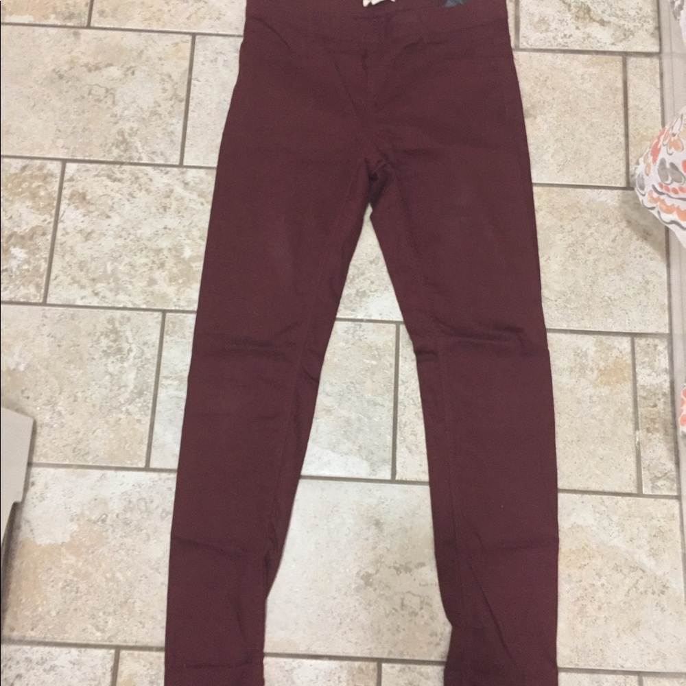 Burgundy skinny jeans. Worn once !
