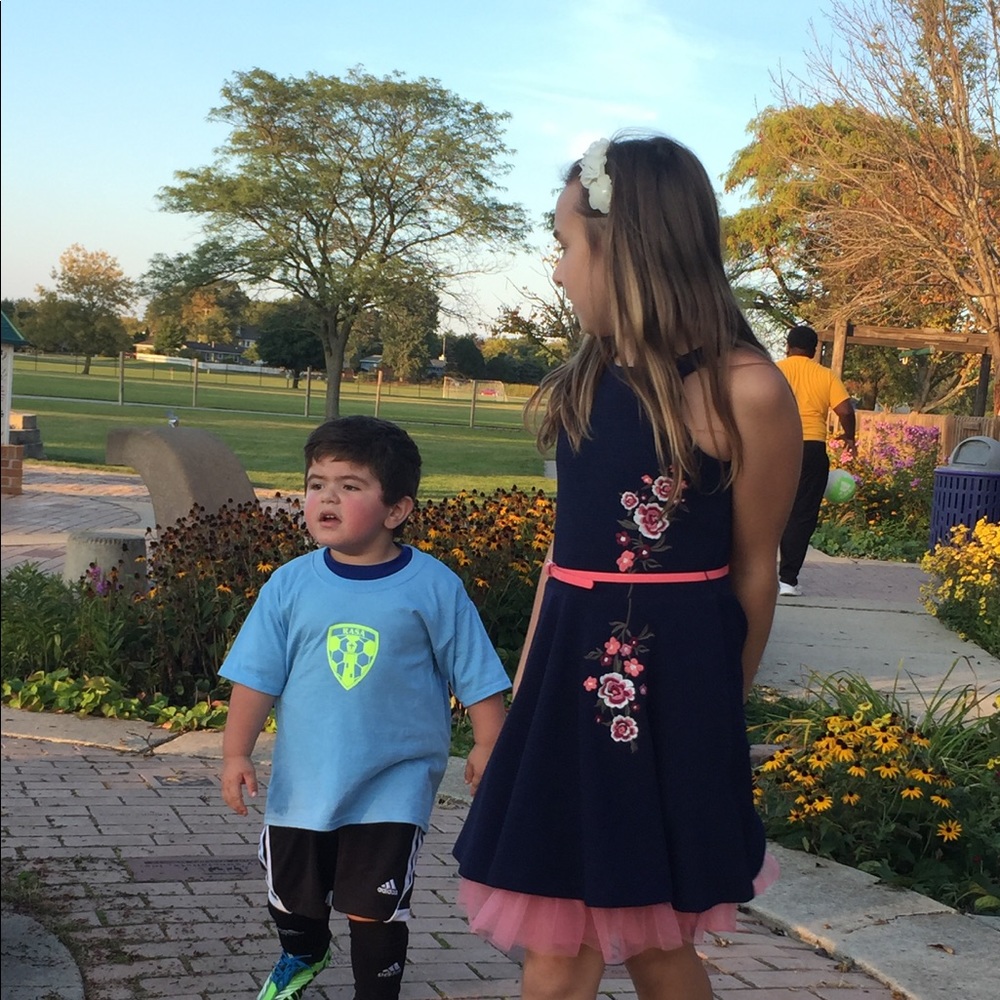 Beautiful girls dress with matching purse