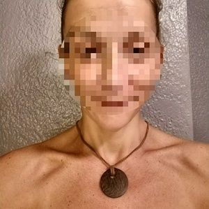 Necklace : Wooden charm on leather cord