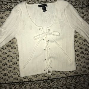 Cropped, distressed lace-up sweater!