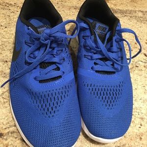 Blue kid size for new without tags Nikes