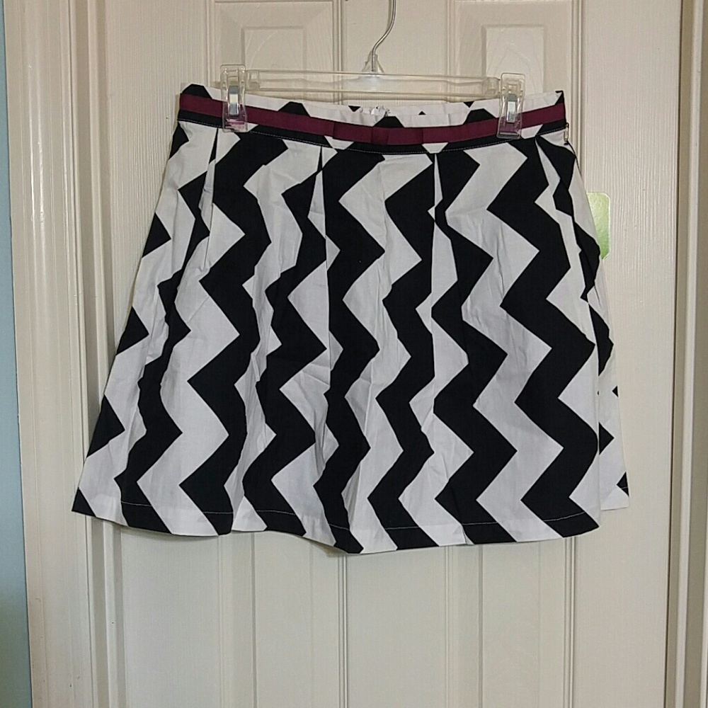 Black and white skirt with garnet accent
