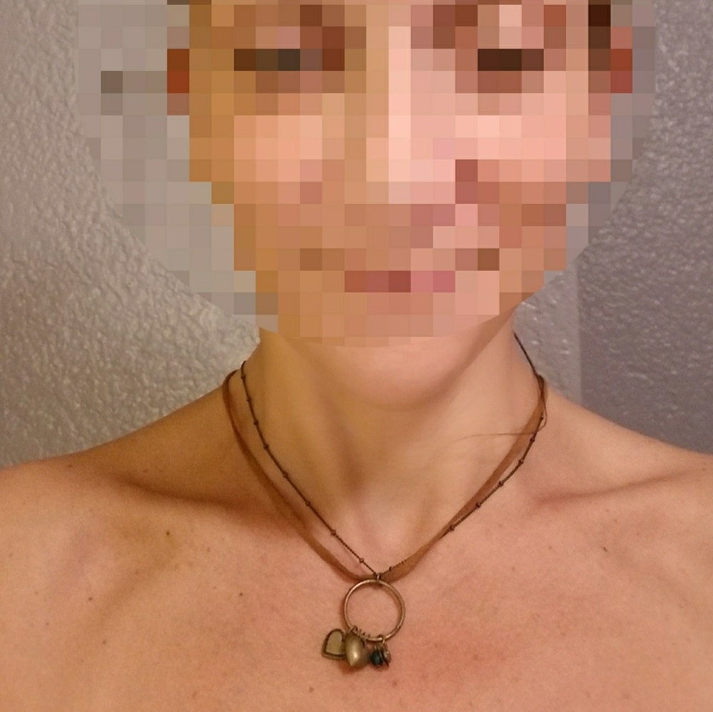 Charms on thin leather and metal chains