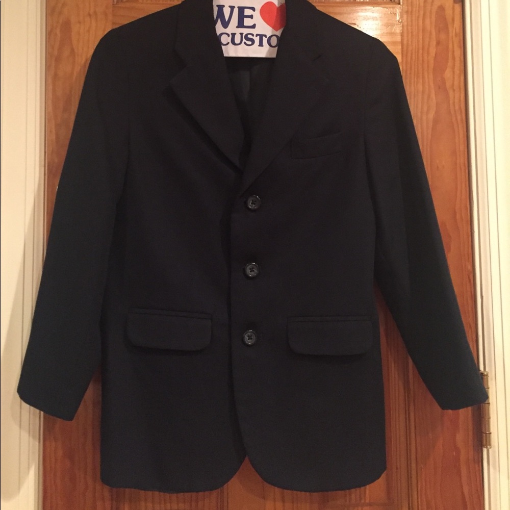 Boy's navy suit jacket.