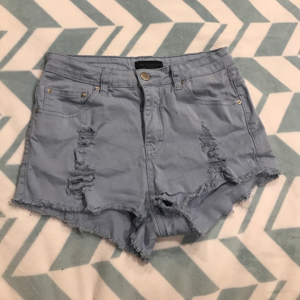 Blue ripped shorts