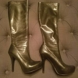 Black stiletto boots.