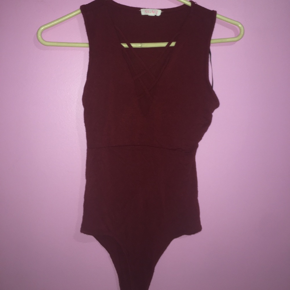 Crisscross body suit