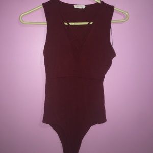 Crisscross body suit