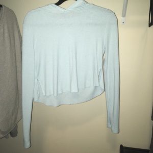 Baby’s blue long sleeve with hood.