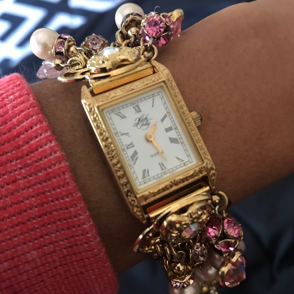 Nicky Folly gold watch