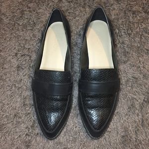 Black pointed toe shoes