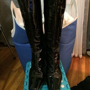 Tall patent leather boots