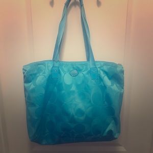 Authentic Coach nylon material bag. Light weight.