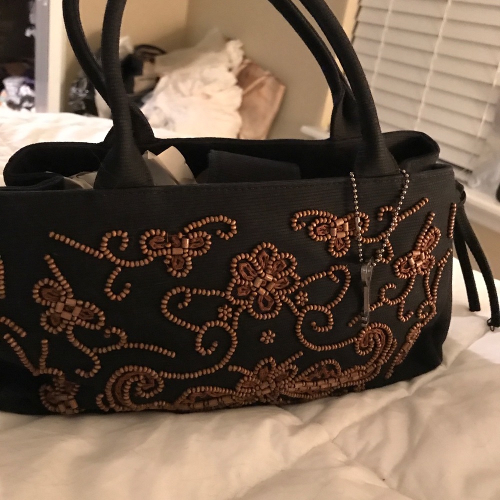 Whole New Twist on the Little Black Bag!