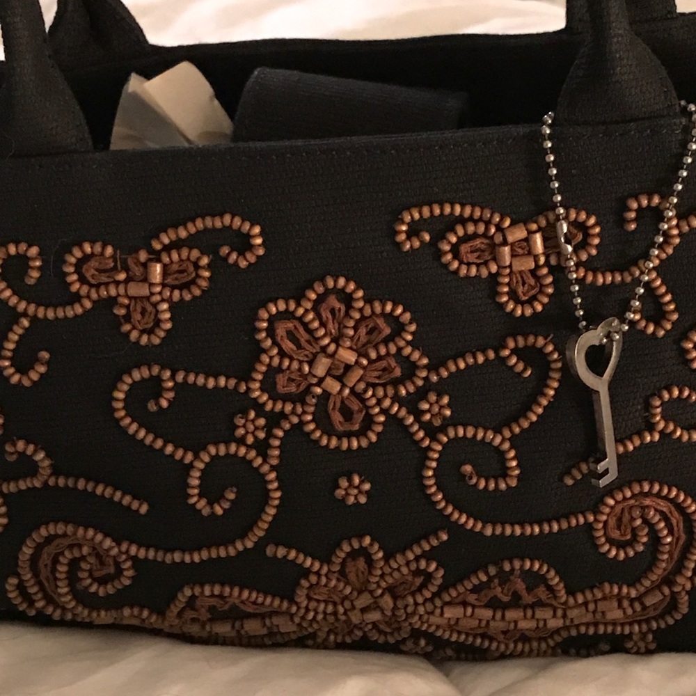 Whole New Twist on the Little Black Bag!