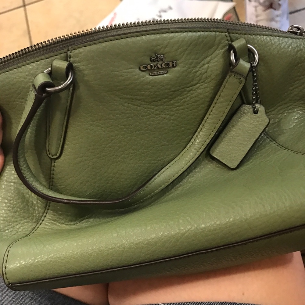 Olive green coach bad- new condition