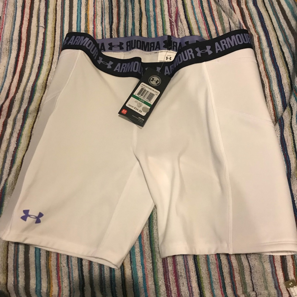 NWT. Undet Armour Strike Zone sliders. Size L.