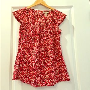 Red printed cap sleeve blouse