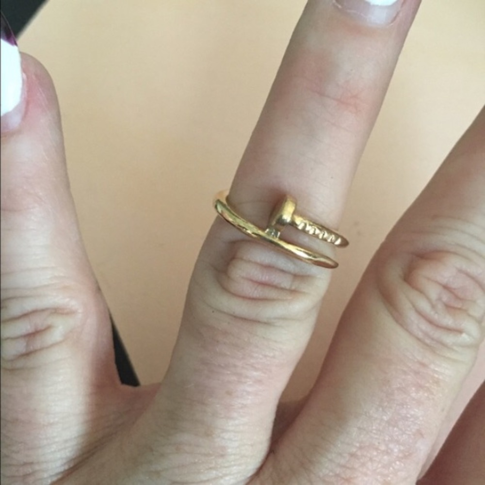 Gold tone nail ring