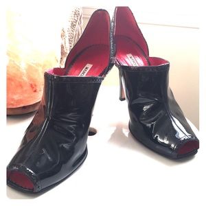 Black leather Manolo Blahnik peep toe stilettos