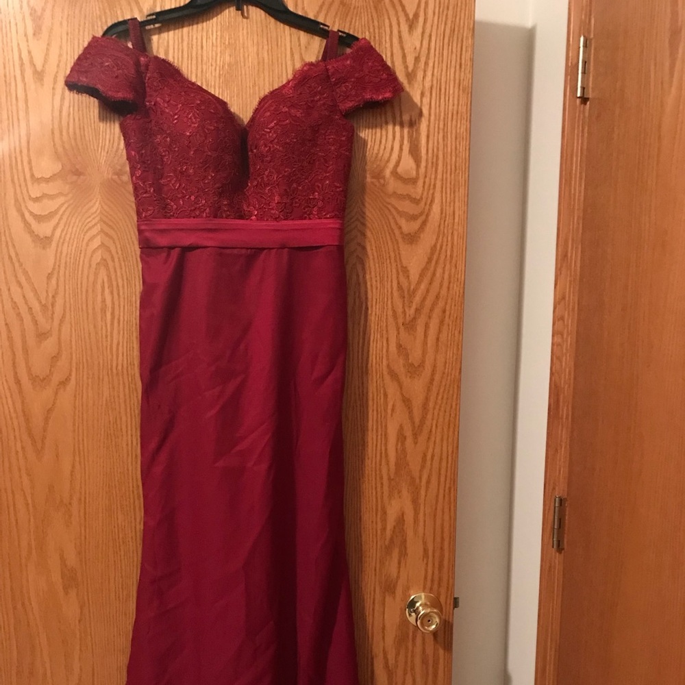 Off-the-shoulder special occasion gown.