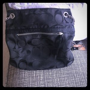 Black coach purse.