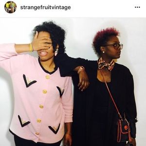 Baby-pink St.Johns cardigan.