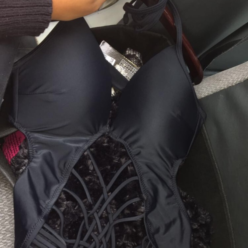 black one piece body suit in women