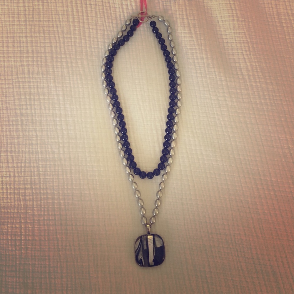 Handmade pearl necklace with artisan pendant