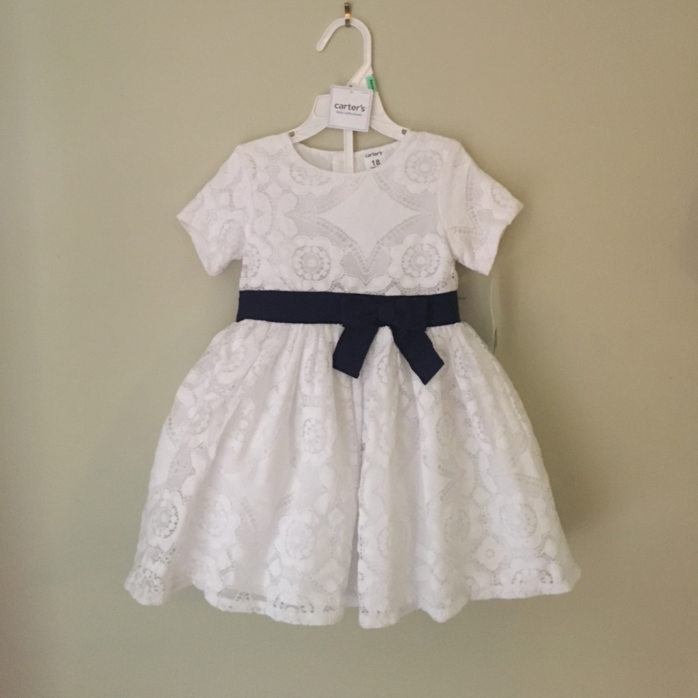 NEVER WORN, tags still on. Size: 18m dress