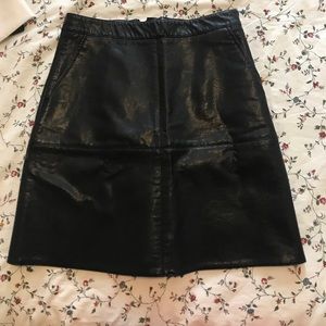 Black faux leather mini skirt
