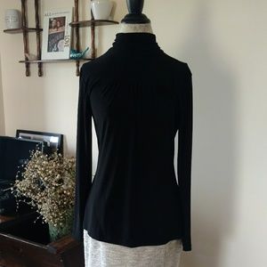 Black stretchy babydoll style turtleneck